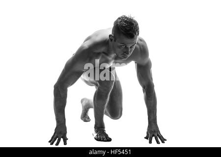 L'homme préparer pour courir. silhouette. isoler sur blanc. Photo en noir et blanc Banque D'Images