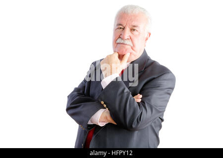 Moitié du corps, portrait of smiling senior woman in suit with hand on chin, fond blanc Banque D'Images