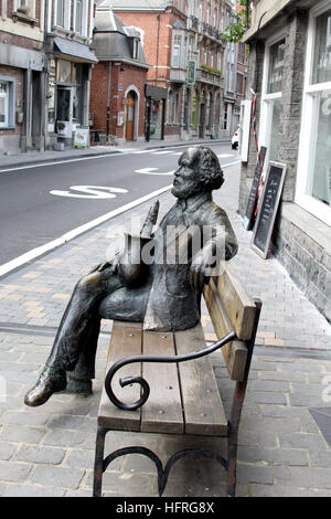 Sculpture d'Adolphe Sax, inventeur du saxophone dans une rue de Dinant, en Belgique, en dehors de son musée dans la ville de sa naissance. Banque D'Images