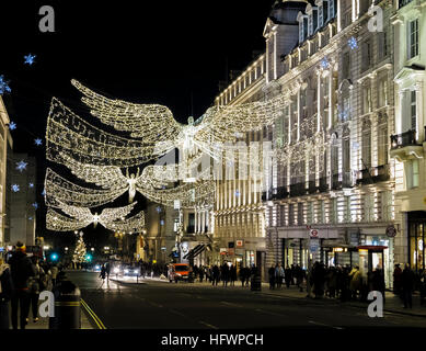 Lumières de Noël Angel Vol de nuit dans la rue Regent, le West End de Londres W1 Banque D'Images