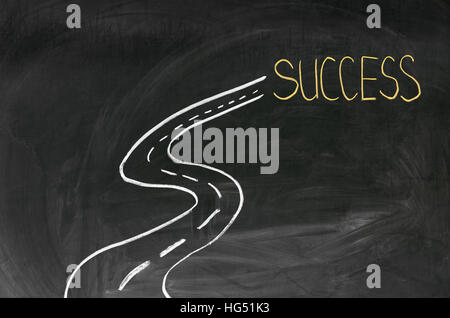 Avec la craie sur le tableau noir peint en route vers le succès Banque D'Images