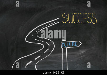 Avec la craie sur le tableau noir peint en route vers le succès Banque D'Images