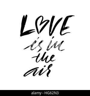 Lettres main citation inspirante. L'amour est dans l'air. Part d'encre brossé lettrage. La calligraphie au pinceau moderne. Vector illustration. Illustration de Vecteur