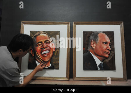 Hangzhou, Hangzhou, Chine. Jan 7, 2017. Hangzhou, Chine - 2 septembre 2016 : (usage éditorial uniquement. Chine).Xu Leping, un artiste de la sculpture, de la peinture sur la sculpture portrait de Barack Obama à Hangzhou, capitale de la Chine de l'est la province du Zhejiang, le 2 septembre 2016. © SIPA Asie/ZUMA/Alamy Fil Live News Banque D'Images