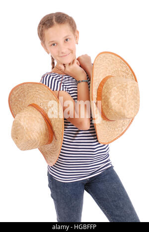 Jolies filles de douze ans portant un grand chapeau de paille disquette isolated on white Banque D'Images