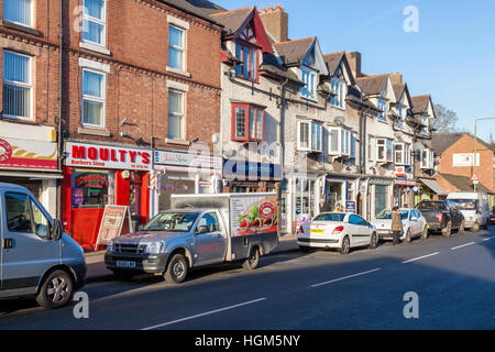 Boutiques sur la rue principale dans le village de Ruddington, Lancashire, England, UK Banque D'Images