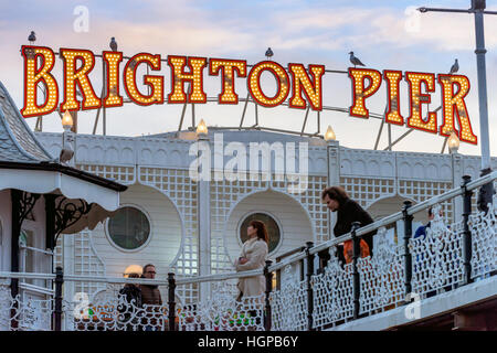 Brighton's Palace Pier at sunset Banque D'Images