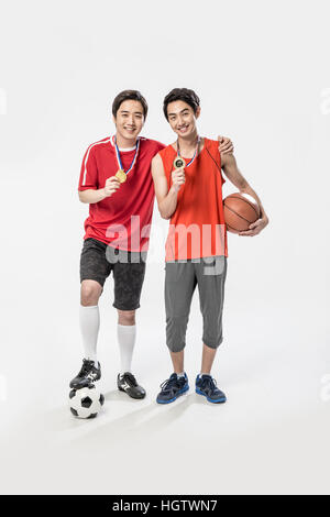 Deux jeunes joueurs de sport coréen posing smiling Banque D'Images