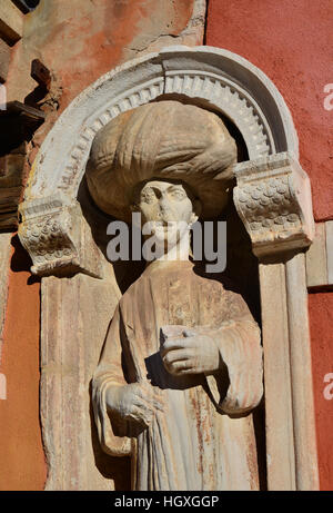 Marchand musulman statue médiévale mauresque proche Place Saint-Marc à Venise Banque D'Images