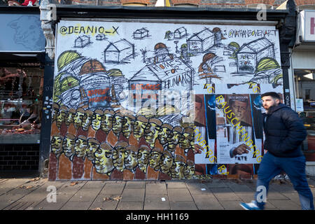 Street art / graffiti dans East Dulwich par Nathan Bowen Migrations réfugiés re Banque D'Images