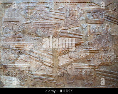 Sumérien antique sculpture sur pierre avec l'écriture cunéiforme l'écriture de scripts Banque D'Images