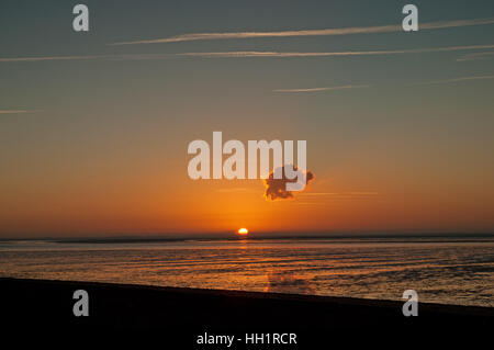 Coucher du soleil sur le Wash de King's Lynn, Norfolk. Banque D'Images