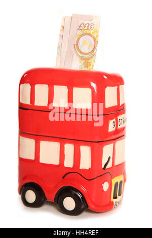 London bus rouge argent ornement fort avec 10 pound note dentelle Banque D'Images
