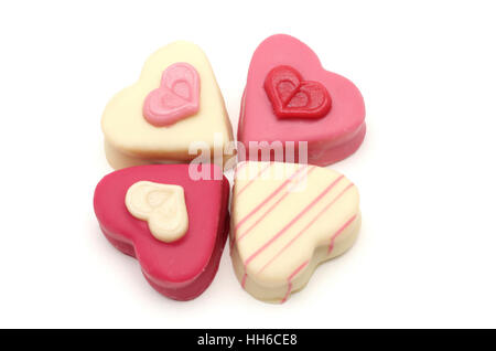 Quatre petits fours en forme de coeur pour la Saint-Valentin Banque D'Images