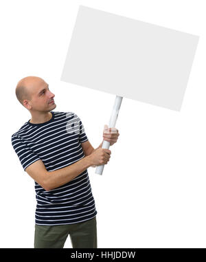 Casual young man holding a placard en haut. Studio isolated Banque D'Images