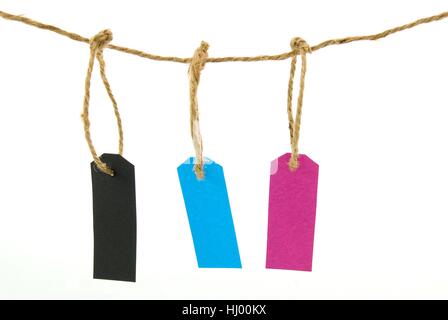 Trois variables dans différentes couleurs accroché à côté de l'autre, isolé Banque D'Images