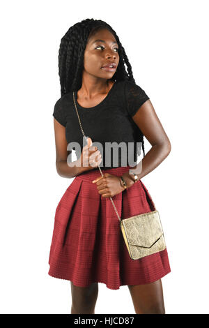 Belle African American Woman holding purse isolé sur fond blanc Banque D'Images