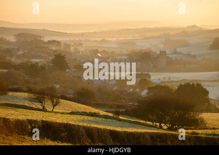 Clair Soleil de Abbotsbury Hill, près de Abbotsbury, Dorset, UK. 25 janvier 2017. Un hiver coloré sunrise de Abbotsbury Hill à la recherche vers l'Abbotsbury. © Dan Tucker/Alamy Live News Banque D'Images