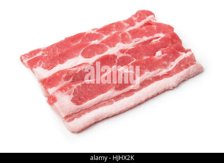 Les tranches de bacon cru isolated on white Banque D'Images
