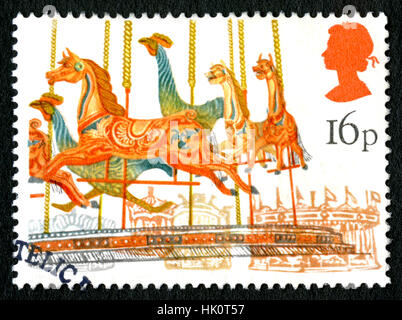 Grande-bretagne - circa 1983 : un timbre-poste utilisé depuis le Royaume-Uni, représentant une illustration d'un carrousel à une fête foraine, vers 1983. Banque D'Images