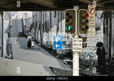 Un mur peint par scène Circular Quay à Sydney en Australie avec feux de circulation. Banque D'Images