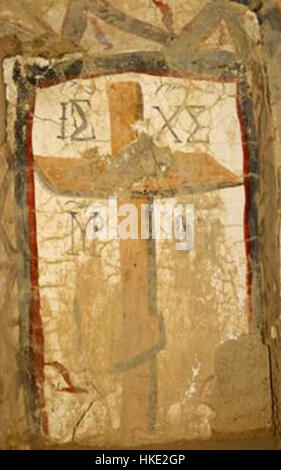 Cette fresque, intitulée 'Freska od Sv. Atanas vo Zovik', dépeint une scène religieuse centrée sur Saint Athanase. Située à Zovik, la fresque est une pièce importante de l'art religieux d'Europe de l'est, mettant en valeur les influences byzantines. Banque D'Images