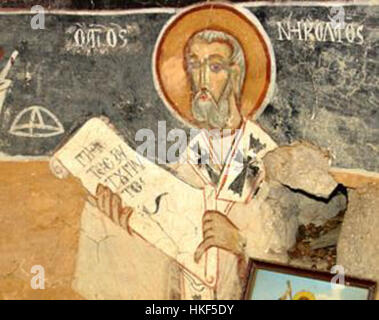 Cette œuvre, intitulée 'Freska od Sv. Atanas vo Zovik' représente une scène religieuse peinte sur une fresque dans une église de Zovik. L’œuvre s’inscrit dans une riche tradition d’art religieux orthodoxe oriental, reflétant les valeurs culturelles et spirituelles de la région. Banque D'Images