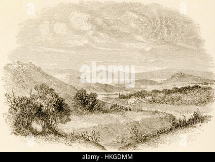 Cette peinture de Christopher Wordsworth, intitulée 'Athènes, de la vallée de l'Ilissus', présente une vue panoramique d'Athènes vue d'un point de vue historique. La pièce de 1882 capture la beauté classique de la ville antique et de son paysage environnant. Banque D'Images
