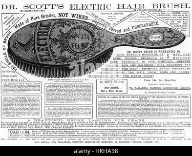 Brosse électrique annonce vers 1882. Les poignées barres de fer aimanté contenait un peu whuch pourrait rendre les cheveux se lever mais il n'y avait pas d'électricité concernées Banque D'Images