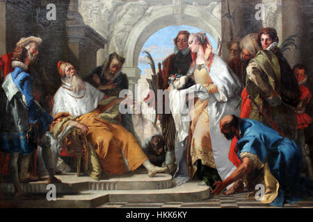 Cette œuvre de 1750 de Giovanni Battista Tiepolo, 'Die Heiligen der Familie Crotta', représente une scène religieuse avec des saints et des anges, illustrant la maîtrise de Tiepolo de l'art baroque et sa capacité à transmettre des thèmes spirituels à travers une composition dramatique et des couleurs vives. Banque D'Images