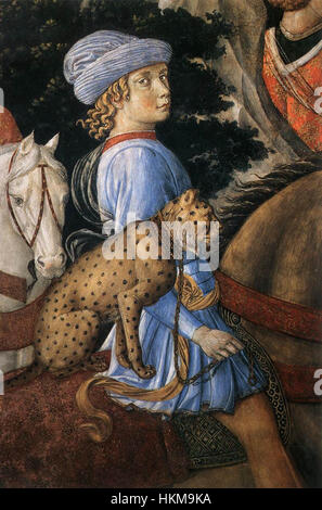 Ce détail de la « procession du plus vieux roi » de Benozzo Gozzoli fait partie d'une plus grande série de fresques qui met en évidence une procession historique. L'utilisation vibrante des couleurs et des détails complexes de Gozzoli donne vie aux personnages royaux, capturant la grandeur de la Renaissance. La peinture, qui est un exemple important de l'art de la Renaissance italienne, reflète l'habileté de Gozzoli à dépeindre le mouvement dynamique et l'imagerie royale. Banque D'Images