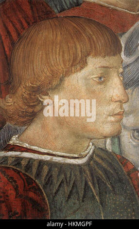 Un détail de la « procession du plus jeune roi » de Benozzo Gozzoli, une partie de la célèbre série de fresques représentant le voyage des Mages. Cette section se concentre sur la conception complexe et les détails riches des figures, illustrant la maîtrise de Gozzoli de la peinture de la Renaissance. Banque D'Images