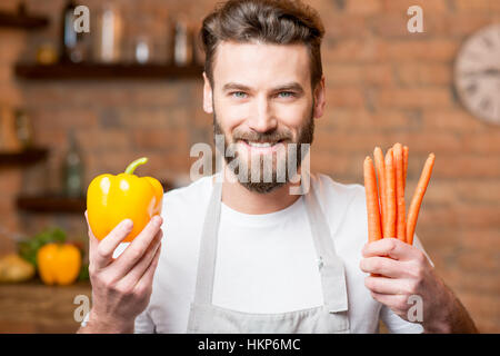 L'homme sur la cuisine Banque D'Images