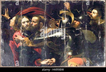 La « prise du Christ » du Caravage est une peinture baroque célèbre, représentant le moment de la trahison du Christ. Cette version endommagée, maintenant à Odessa, montre l'intensité du travail de Caravage, avec son utilisation dramatique de la lumière et de l'obscurité, capturant la profondeur émotionnelle de la scène. Banque D'Images