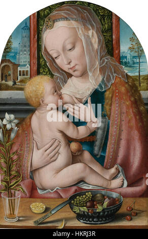 'Maria Lactans', peint par le cercle de Joos van Cleve, représente la Vierge Marie allaitant l'enfant Jésus, un thème commun à la Renaissance La pièce reflète le rendu délicat des expressions faciales et des draperies détaillées typiques de l'époque. Banque D'Images