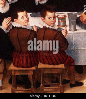 *Family Sing Grace* d'Anthony Claeissins, peint vers 1585, capture une famille réunie autour d'une table, en remerciant. L'œuvre reflète les valeurs religieuses et familiales de l'Europe du XVIe siècle. Banque D'Images