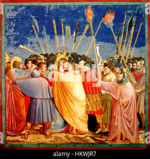 « L'arrestation du Christ » de Giotto di Bondone décrit le moment de la trahison dans la tradition chrétienne. La scène capture le baiser de Judas, un moment charnière menant à l'arrestation du Christ. L'œuvre est connue pour sa profondeur émotionnelle et l'utilisation de la perspective, qui était révolutionnaire pour son époque. Banque D'Images