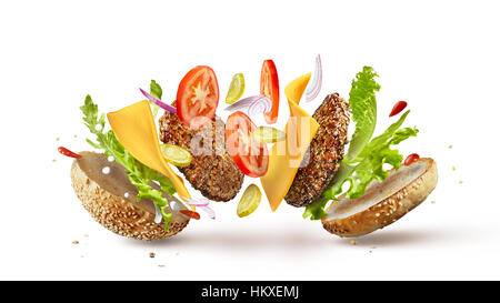 Burger ingrédients préparation tomber en place isolated on white Banque D'Images