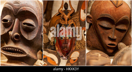 Le Masai Mara, Kenya - 03 janvier : sculptures, masques pour les cérémonies à la boutique de souvenirs pour touristes 3 janvier 2013 dans le Masai Mara, Kenya, des masques en bois. Banque D'Images