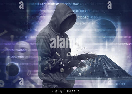 Hacker à capuchon homme avec masque anonyme de la saisie sur clavier virtuel sur fond de code binaire Banque D'Images