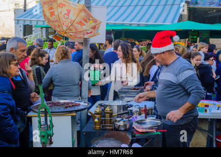 Haïfa, Israël - le 10 décembre 2016 scène de marché : avec les vendeurs, les consommateurs et les sucreries orientales, dans le cadre de la maison de vacances d'événements, de Haïfa, Isra Banque D'Images