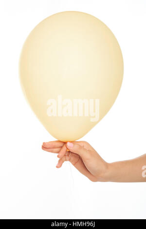 Ballon en main jaune isolé sur fond blanc Banque D'Images