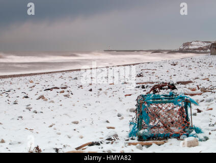 Lobster Pot dans la neige Banque D'Images