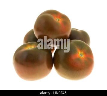 Un groupe d'une tomates mûres brown isolé sur un fond blanc. Banque D'Images