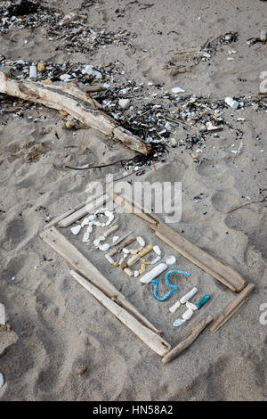 'Ordures' signe fait inconnu sur la plage, Devon Banque D'Images