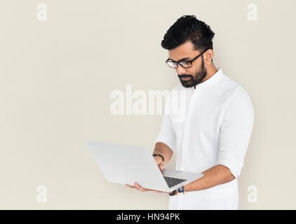 Indian Man with Laptop Concept Banque D'Images