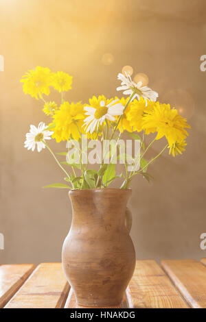 Tableau fleurs sur le coucher du soleil Banque D'Images