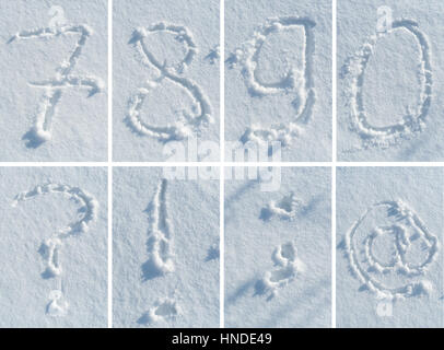 Alphabet anglais écrits à la main dans la neige - un jeu de polices complet de lettres, chiffres et signes de ponctuation Banque D'Images
