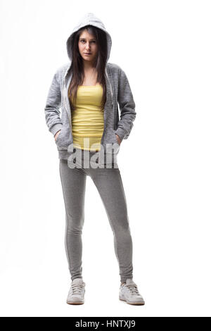 Jeune femme sur tracksuit sur fond blanc, isolated on white Banque D'Images