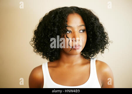 Portrait of serious Mixed Race woman Banque D'Images